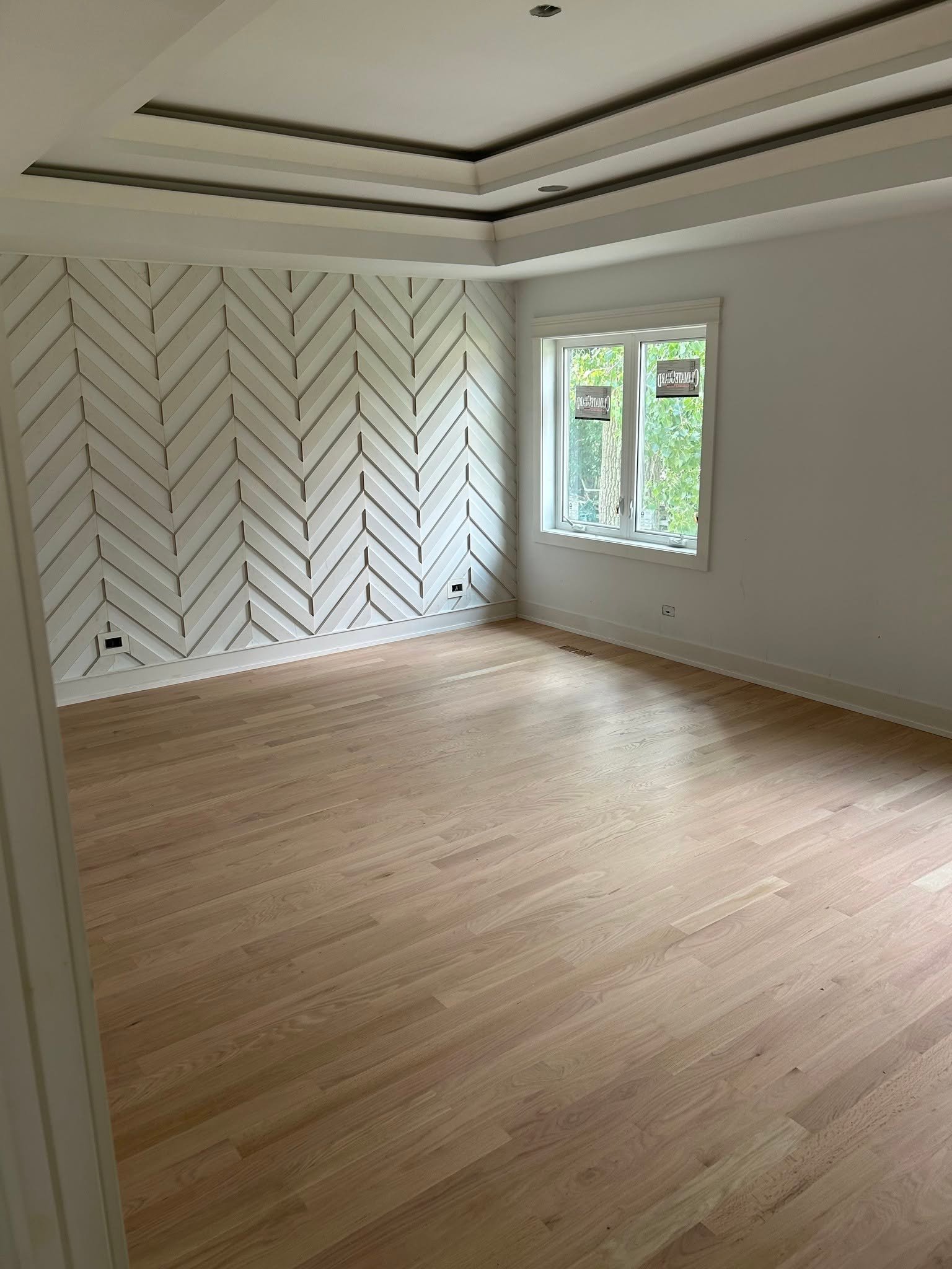 Herringbone pattern hardwood flooring installation