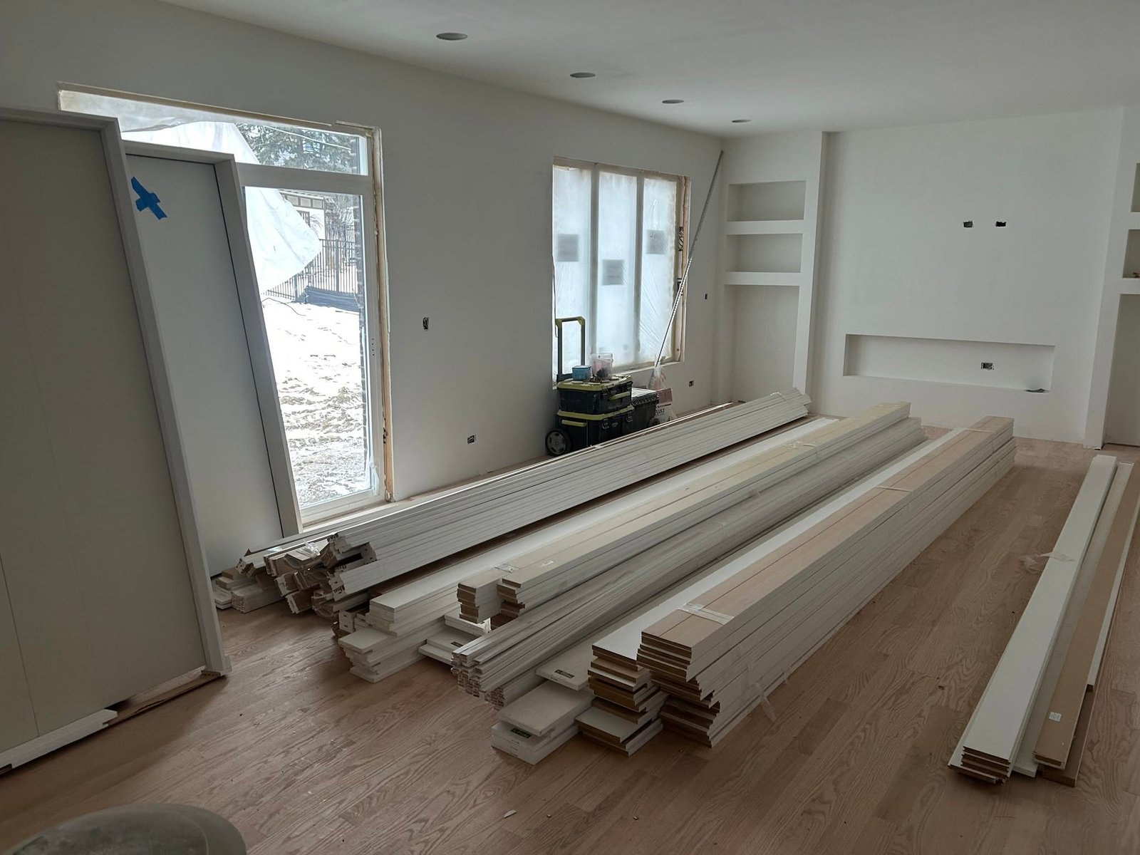 Flooring materials staged and ready for a Swift Step installation
